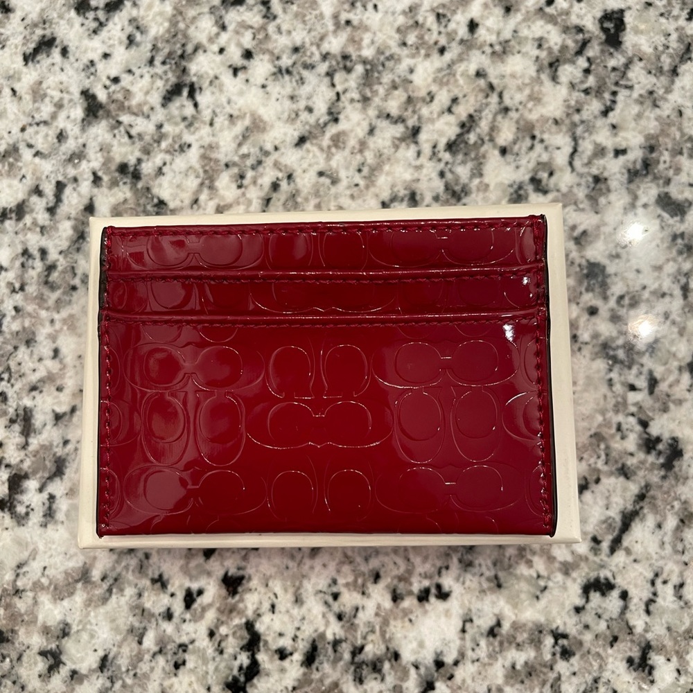 Embossed logo gloss card case/holder